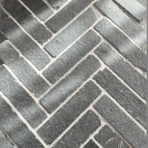 Black Limestone Herringbone 200x50 Tumbled Cobble Setts.